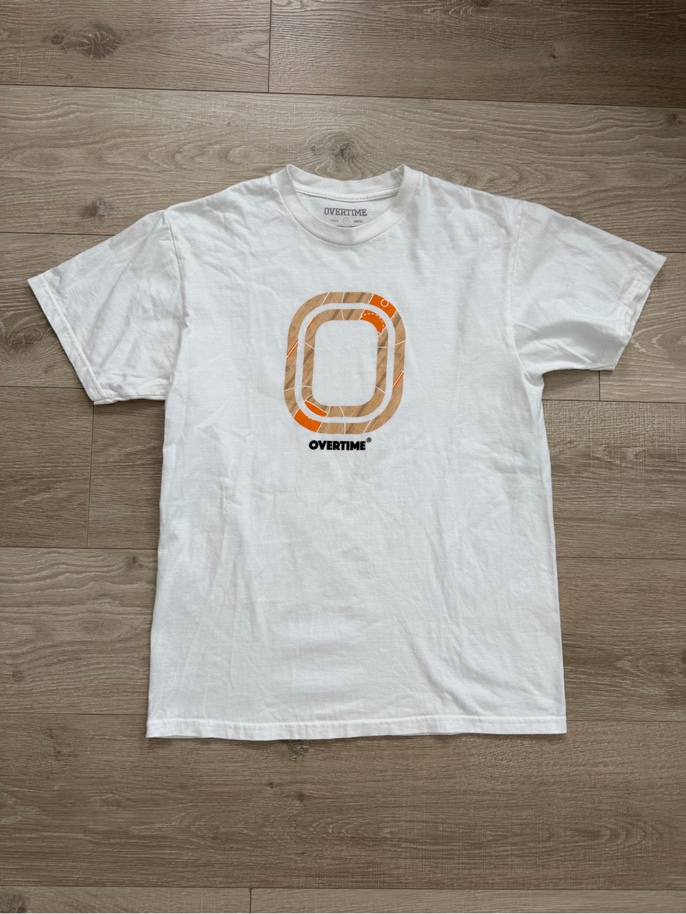 White Overtime T-Shirt with Orange Graphic